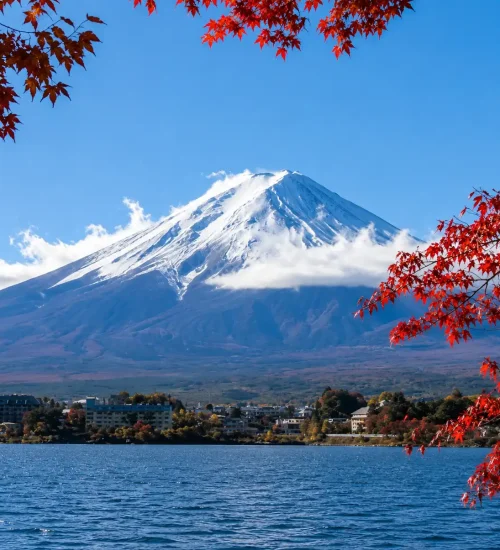 When in Japan, visiting Mount Fuji is high on people’s wish lists. If you’re visiting Tokyo, you can take an easy day trip to the Mount Fuji area. You can see Japan’s most iconic landmark up close. If you have not seen Mount Fuji yet, planning a day trip from Tokyo can be hard. This is especially true if you have only seen it briefly from the Shinkansen between Tokyo and Kyoto. Mount Fuji hides in the clouds often, and there are a few different ways to get there on public transport. To help, I made this handy guide for a day trip to Mount Fuji from Tokyo. It also includes a sample itinerary. Mount Fuji Day Trip Overview When you’re visiting Mount Fuji on a day trip, you’ll be visiting the areas around Mount Fuji. Kawaguchiko and Fujiyoshida are the most popular spots in the Fuji Five Lakes area. They are easy to reach by public transport. They also offer some of the best views of the iconic mountain. However, don’t let social media fool you. You don’t need to visit the exact “Instagram” spots to see Mount Fuji. Mount Fuji is visible from most places around the Five Lakes Area. These Instagram-famous spots are causing local traffic problems. You can see views throughout Fujiyoshida, not just the “famous” photo spots. Wander around the town, and you’ll enjoy incredible views in every direction. I took the photo below on a random street while walking around Fujiyoshida. If you have a rental car, checking out some of the other lakes can be a great way to avoid large, densely packed crowds. How to Get to Mount Fuji from Tokyo There are different ways to get to Mount Fuji from Tokyo. You’ll want to go to Kawaguchiko Station. From there, you can easily explore the area. You can also see Mount Fuji clearly. Here are the best ways to get there: 1) By Highway Bus – Best for Budget Travellers Compared to the train, taking the bus from Tokyo to Kawaguchiko is more straightforward, less expensive, and often faster. A one-way highway bus ticket typically costs ¥2,000–¥3,000, while trains can cost significantly more and involve transfers. For instance, a typical train route involves taking the JR Chuo Line from Shinjuku to Otsuki, then transferring to the Fujikyu Railway. This not only takes more time (about 2.5–3 hours total), but also costs closer to ¥3,000–¥4,000 depending on ticket types. In contrast, the bus ride is direct and comfortable. There’s no need to transfer or worry about finding platforms in busy train stations. Buses are equipped with amenities like reclining seats, air conditioning, and onboard toilets. There’s also space for large luggage underneath the bus. Many travelers appreciate the scenic ride and relaxed experience. Ticket Prices and Booking Options Ticket prices typically range from ¥2,000, depending on the time of day, departure point, and seat availability. Late-night or peak holiday departures may be slightly more expensive. All seats are reserved in advance and come with assigned seating. This means no standing or searching for a spot—it’s a guaranteed, comfortable ride. Here are the best ways to book your bus ticket: What to Do Around Mount Fuji in One Day With limited time, choosing one or two stops is usually enough. Higher viewpoints work best when the sky is clear. The Mount Fuji Panoramic Ropeway offers elevated views with little effort, while the Mount Fuji 5th Station should be treated as optional and weather-dependent. When Mount Fuji is partly hidden, ground-level stops feel more rewarding. Mount Fuji Day Trip Itinerary (Self-Guided) If you’re planning on taking a DIY day trip to Mount Fuji, here is a suggested itinerary that you can use: Morning: Departure & Panoramic Views 8:00 AM – Departure: Leave Tokyo or Shinjuku Station early. The sooner you go, the better your mountain views. 10:00 AM – Arrival at Kawaguchiko Station: When you arrive, buy a local sightseeing bus pass. Travel will be easier all day. 10:30 AM – Mount Fuji 5th Station: Travel partway up the mountain for a close view of Fuji. You will need good weather. Mid-Day: Lake Kawaguchiko & Lunch 12:30 PM – Lake Kawaguchiko Exploration: Take a relaxed walk along the lakeshore. You can get a classic postcard shot here. See Mt. Fuji reflected in the water. 1:30 PM – Local Lunch: Refuel with a bowl of Yamanashi’s famous Houtou noodles. They are thick, hearty, and perfect after a morning of sightseeing. Afternoon: Sightseeing & Historic Spots 2:30 PM – Oshino Hakkai Visit: Wander through this charming traditional village, home to eight crystal-clear spring-fed ponds with Mt. Fuji rising in the background. 4:00 PM – Chureito Pagoda (Optional): If time allows, this iconic five-story pagoda offers the single most photographed view of Mt. Fuji in all of Japan. Evening: Return to Tokyo 5:30 PM – Souvenir Shopping: Grab some local snacks and gifts near Kawaguchiko Station before heading back. 6:30 PM – Return Journey: Catch your bus or train back to Tokyo, tired but with a memory card full of Fuji photos. Essential Travel Tips for Your Mt. Fuji Trip Best Time to Visit for Clear Views Here's the honest truth: Mt. Fuji is shy. It loves hiding behind clouds, especially in the afternoon. Your best chance for a clear, open view is in the early morning. Winter months, from November to February, often have the clearest skies. Booking Tickets in Advance Both the Fuji Excursion train and the highway buses are popular. Seats fill up fast, especially on weekends. This is common during the cherry blossom and autumn foliage season. Book your tickets at least one month in advance to avoid disappointment. Planning Your Base in Tokyo First? Before heading out to Mount Fuji, make sure you've mapped out your time in Japan's bustling capital! Check out our ultimate Tokyo Travel Guide for the best neighborhoods, local food markets, and step-by-step daily itineraries.